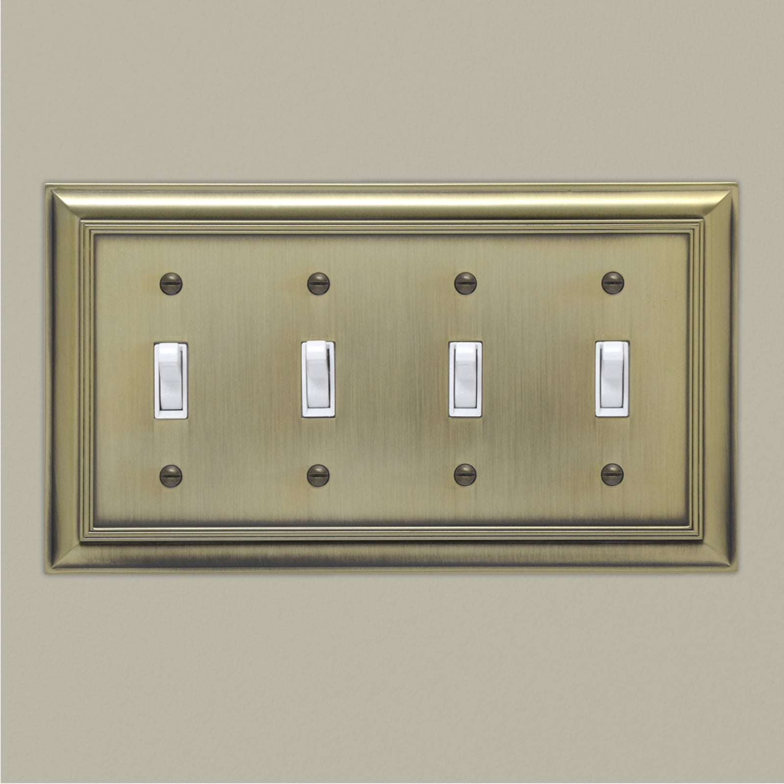 AmazonBasics Quadruple Toggle Wall Plate, Antique Brass, 1-Pack